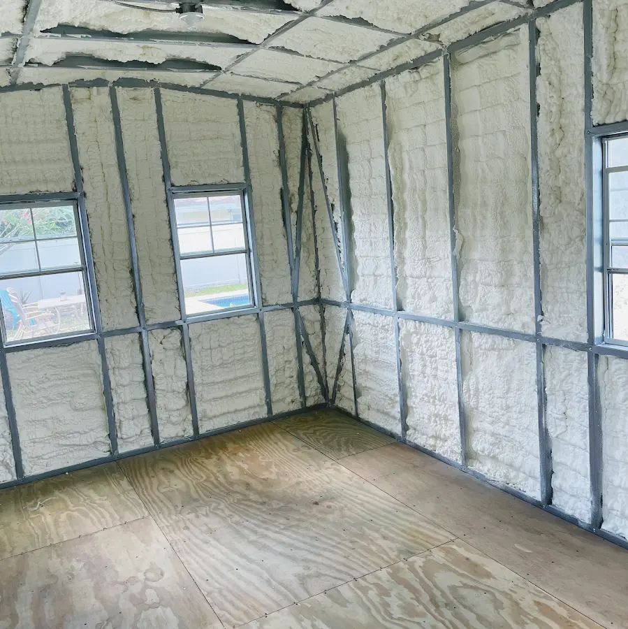 Closed-cell spray foam insulation applied to wall cavities in a residential project in Huntley